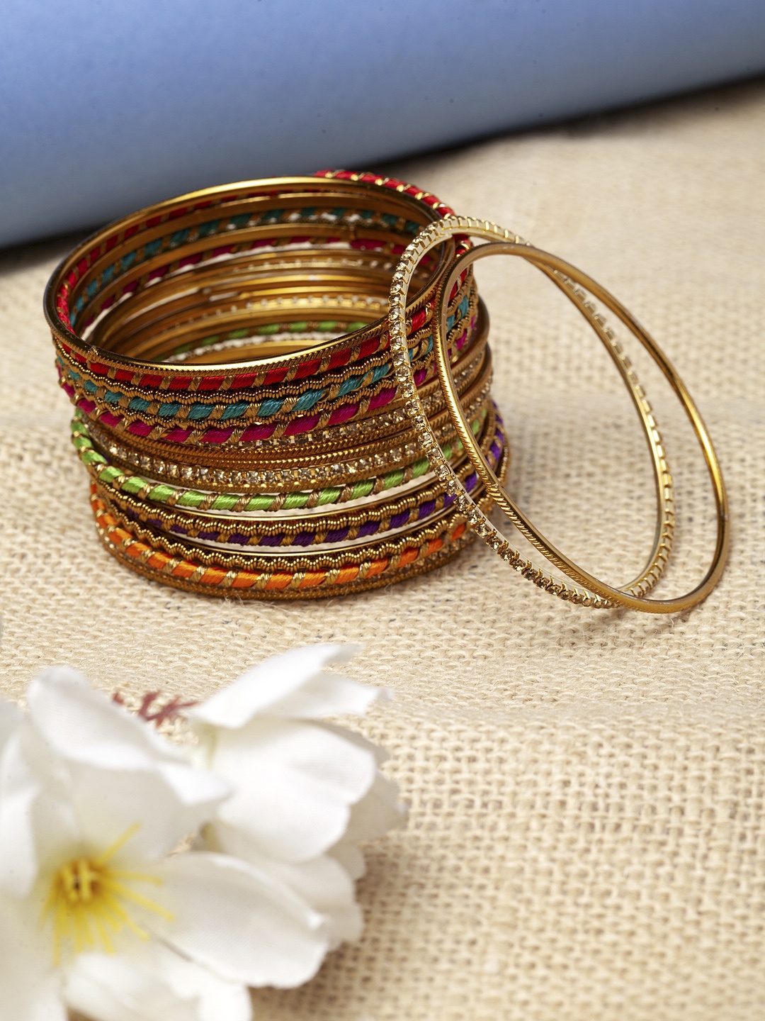 

Shining Diva Set Of 22 Gold-Plated Blue & Red Stone-Studded Antique Bangles