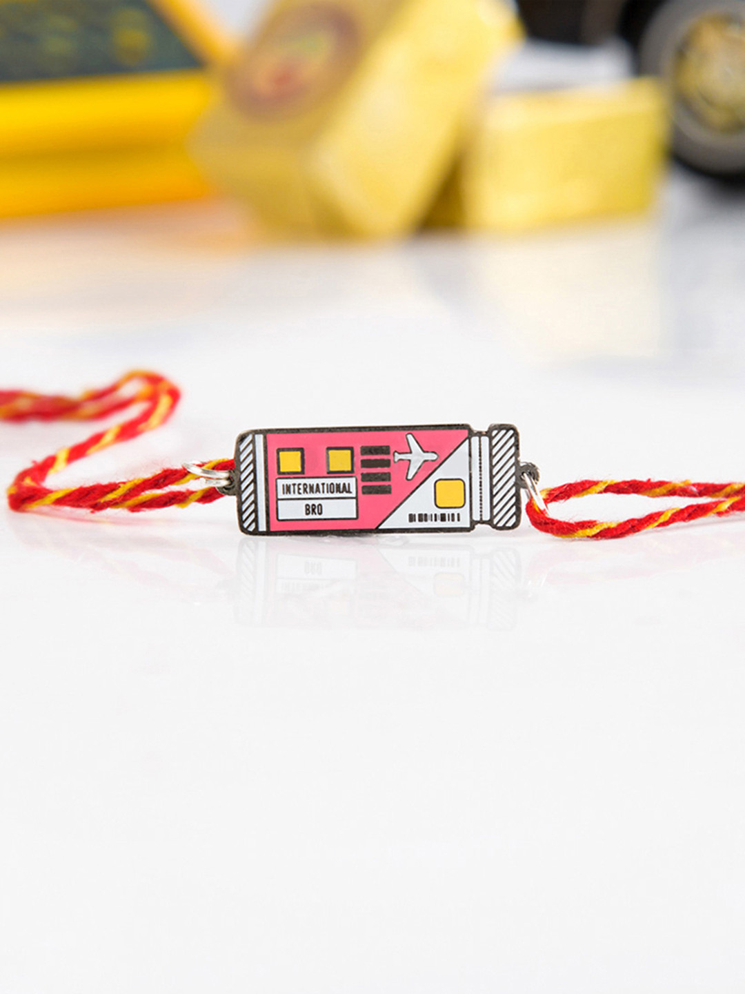 

Bigsmall Pink & White Metal Brass-Plated International Bro Rakhi