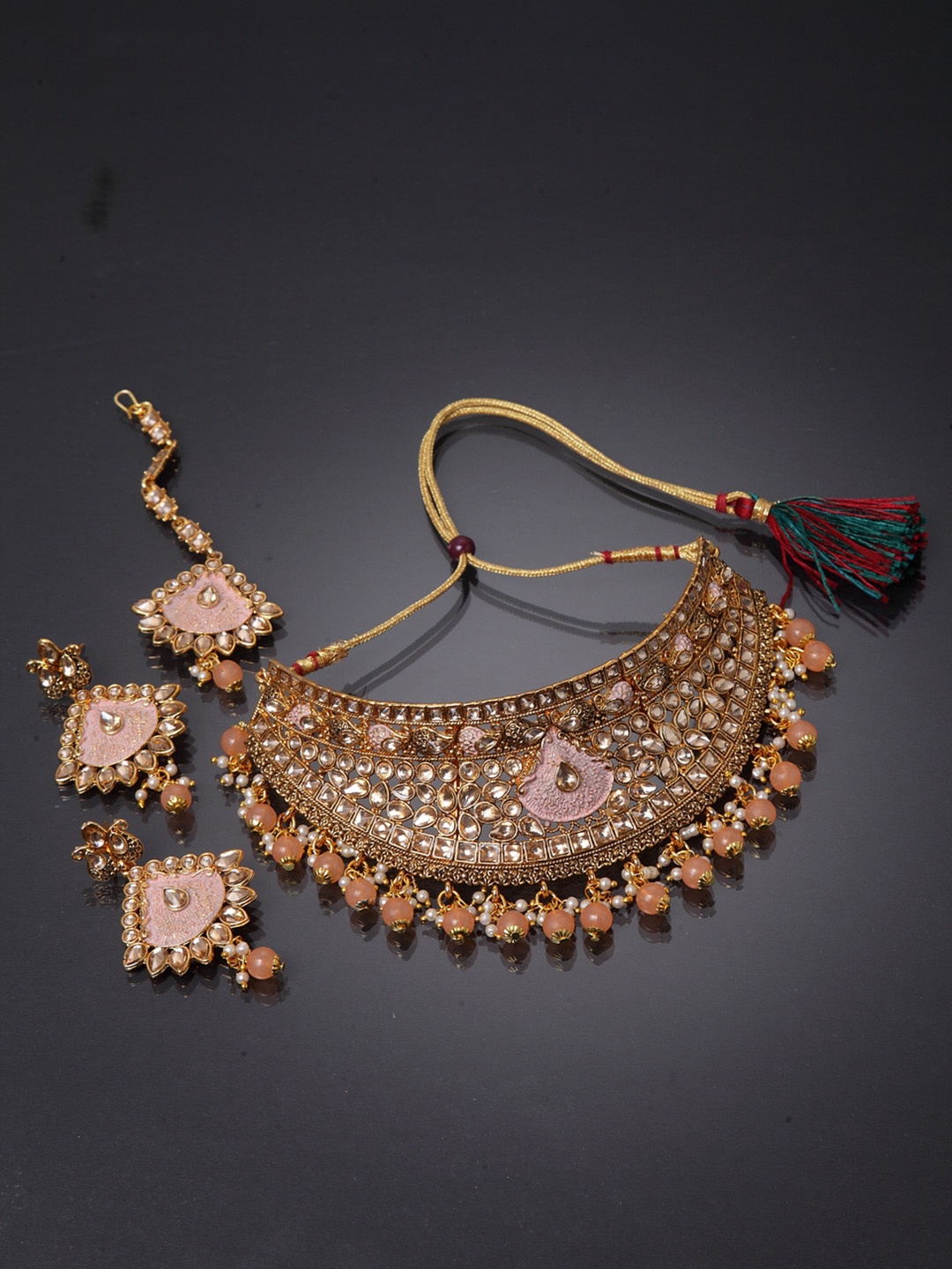 

ANIKAS CREATION Gold-Plated Beige & Peach-Coloured Kundan-Studded Enamelled Bridal Look Choker Jewellery Set