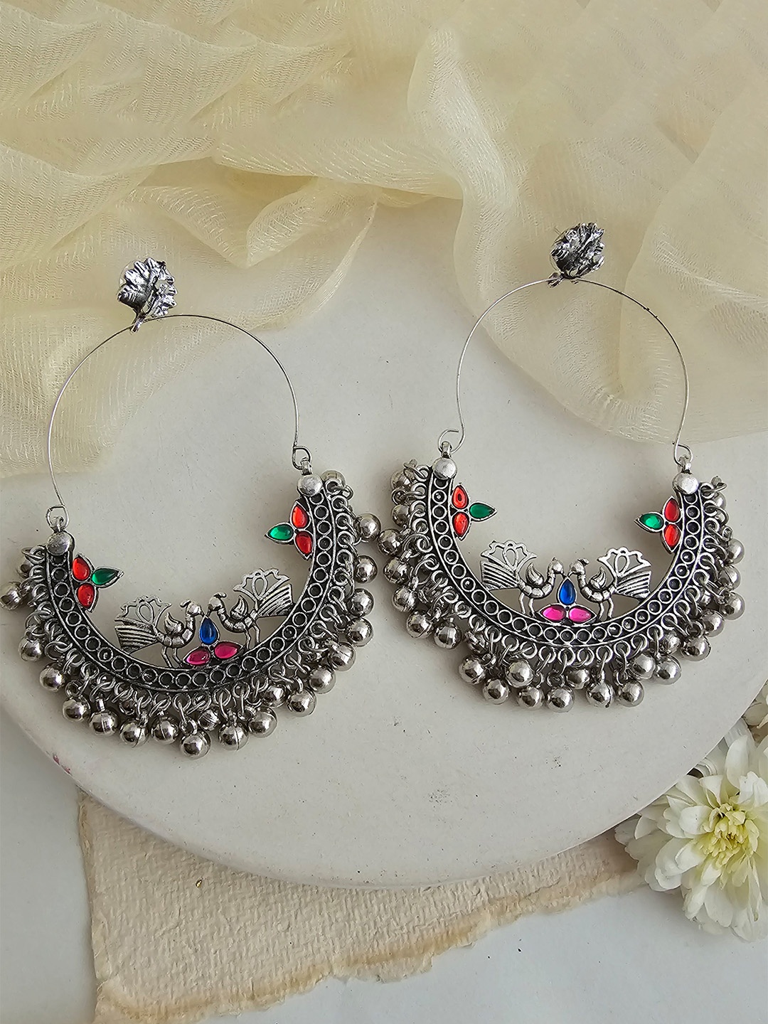 

Binnis Wardrobe Silver-Plated Peacock Shaped Oxidised Chandbalis