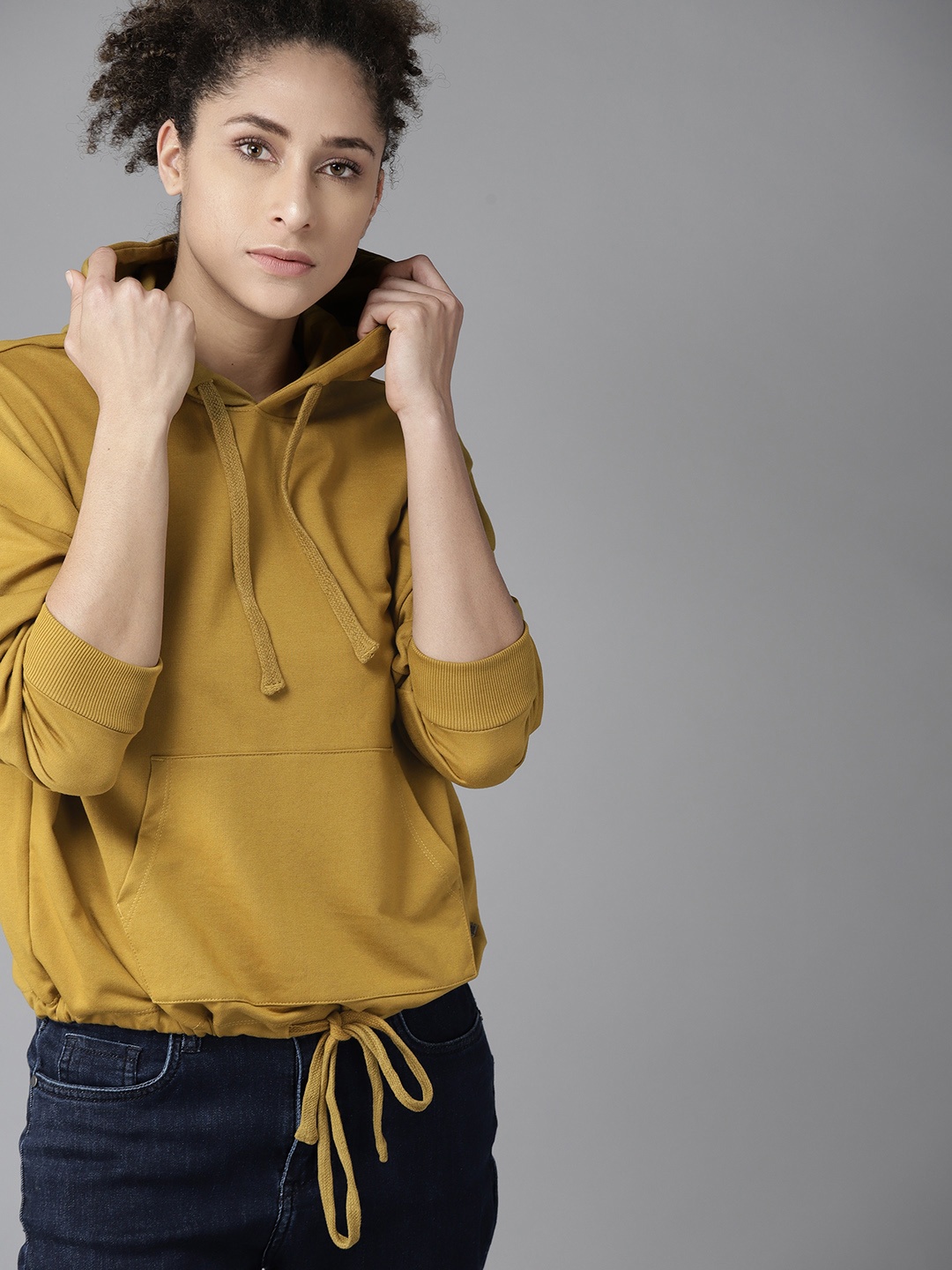 

Roadster Women Mustard Yellow Waist-Tie Solid Hooded Sweatshirt