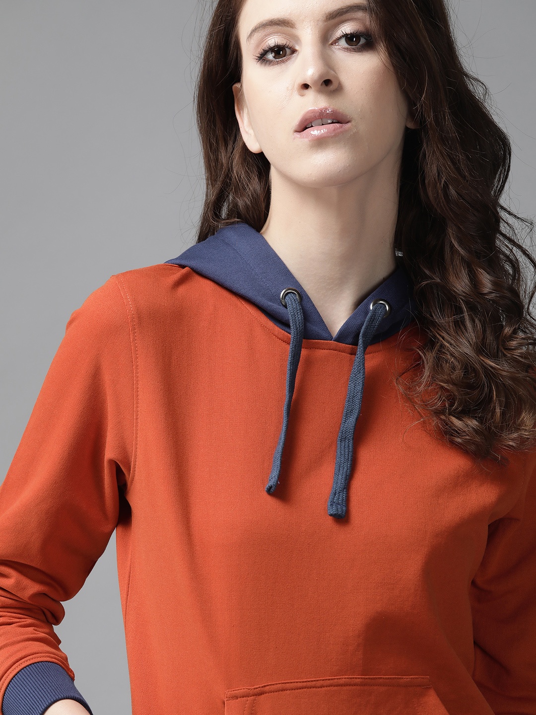 

Roadster Women Rust Orange Solid Hooded Sweatshirt