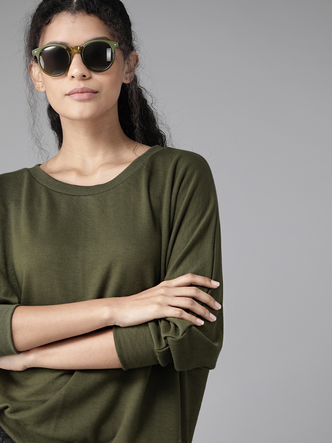 

Roadster Women Olive Green Solid Sweatshirt