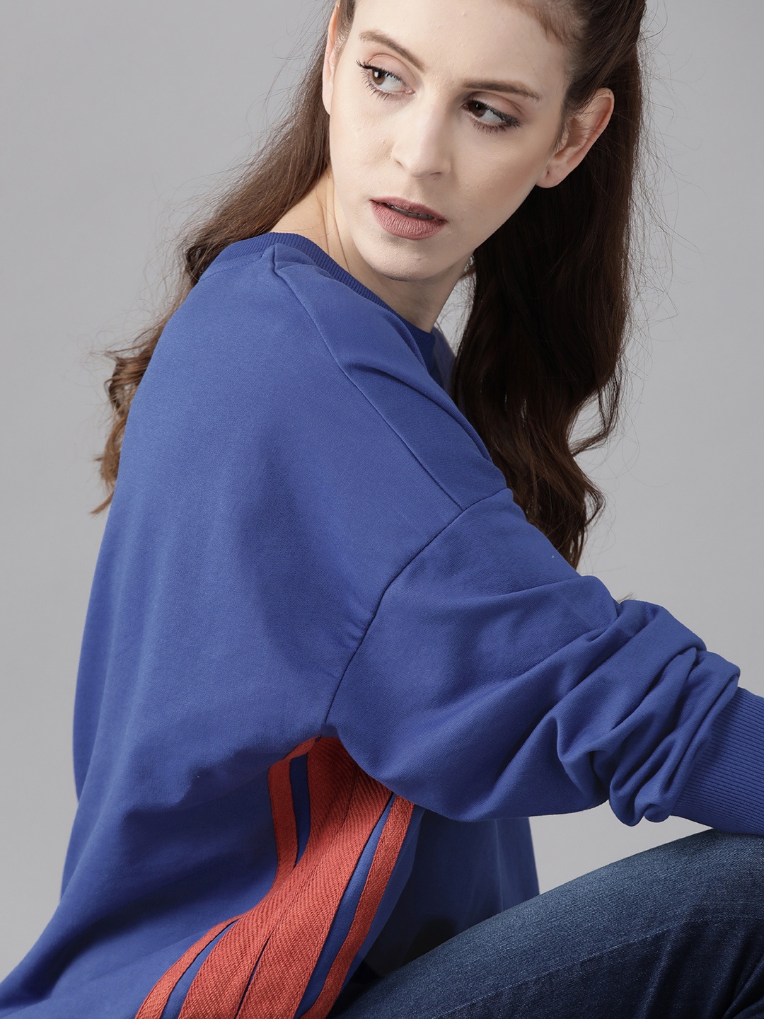 

Roadster Women Blue Solid Oversized Sweatshirt