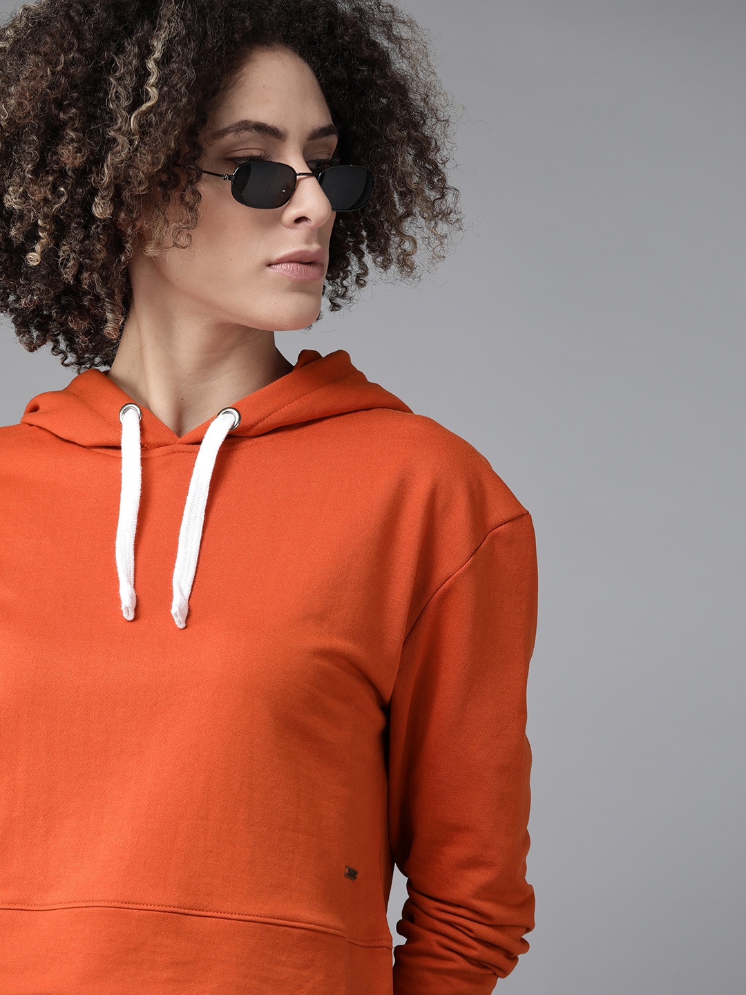 

Roadster Women Rust Orange Solid Hooded Sweatshirt
