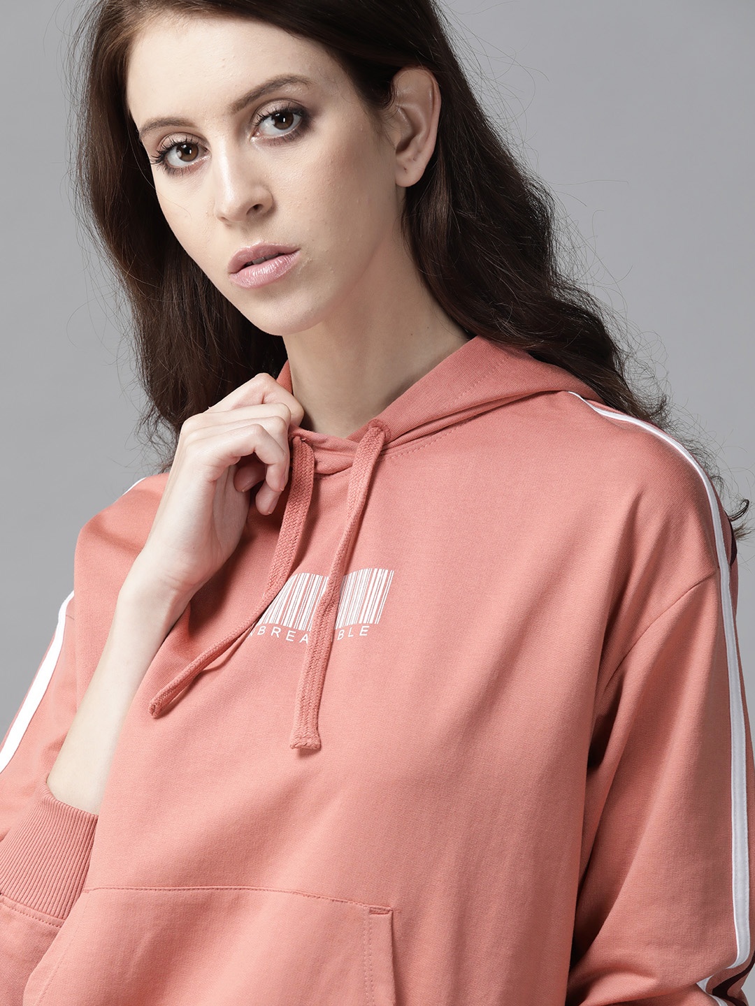 

Roadster Women Pink Solid Hooded Sweatshirt