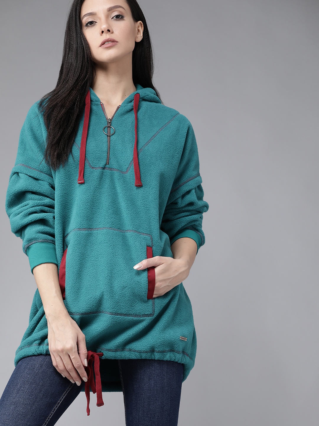 

Roadster Women Teal Blue Solid Fleece Hooded Longline Sweatshirt