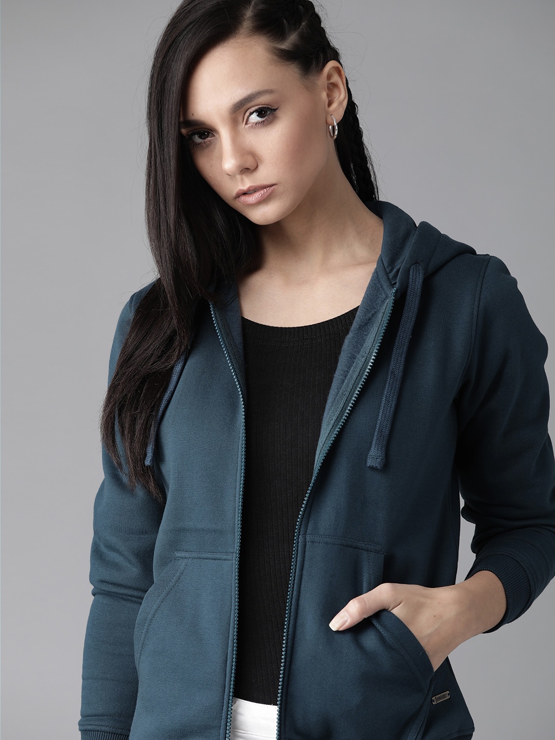 

Roadster Women Teal Blue Solid Hooded Sweatshirt