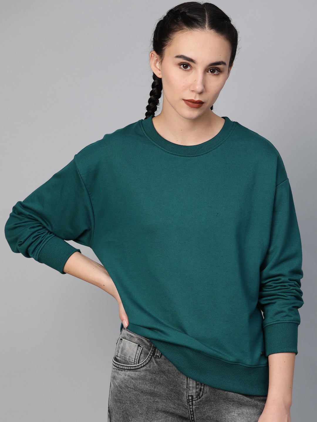 

Roadster Women Green Solid Sweatshirt