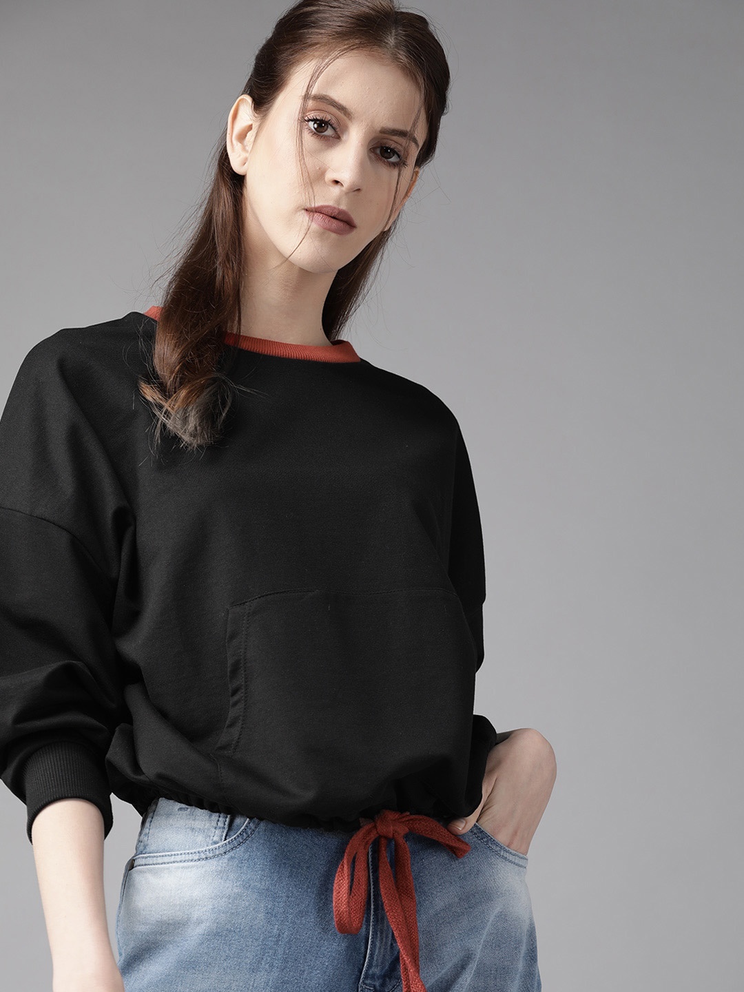 

Roadster Women Black Solid Sweatshirt