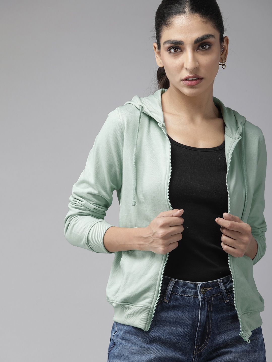 

Roadster Women Sea Green Solid Hooded Sweatshirt