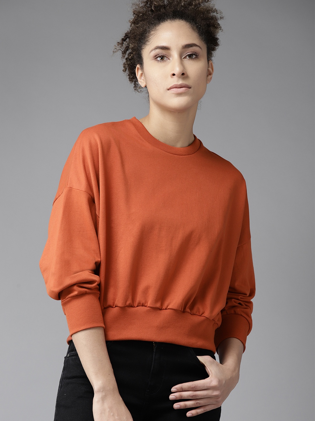 

Roadster Women Rust Orange Drop-Shoulder Solid Sweatshirt
