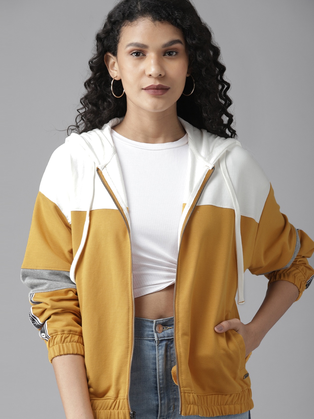 

Roadster Women Mustard Yellow & White Colourblocked Hooded Sweatshirt