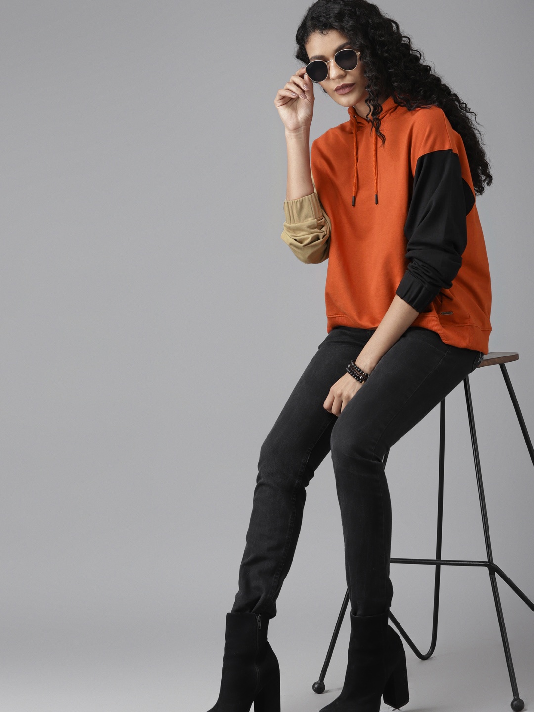 

Roadster Women Rust Orange Solid Hooded Sweatshirt
