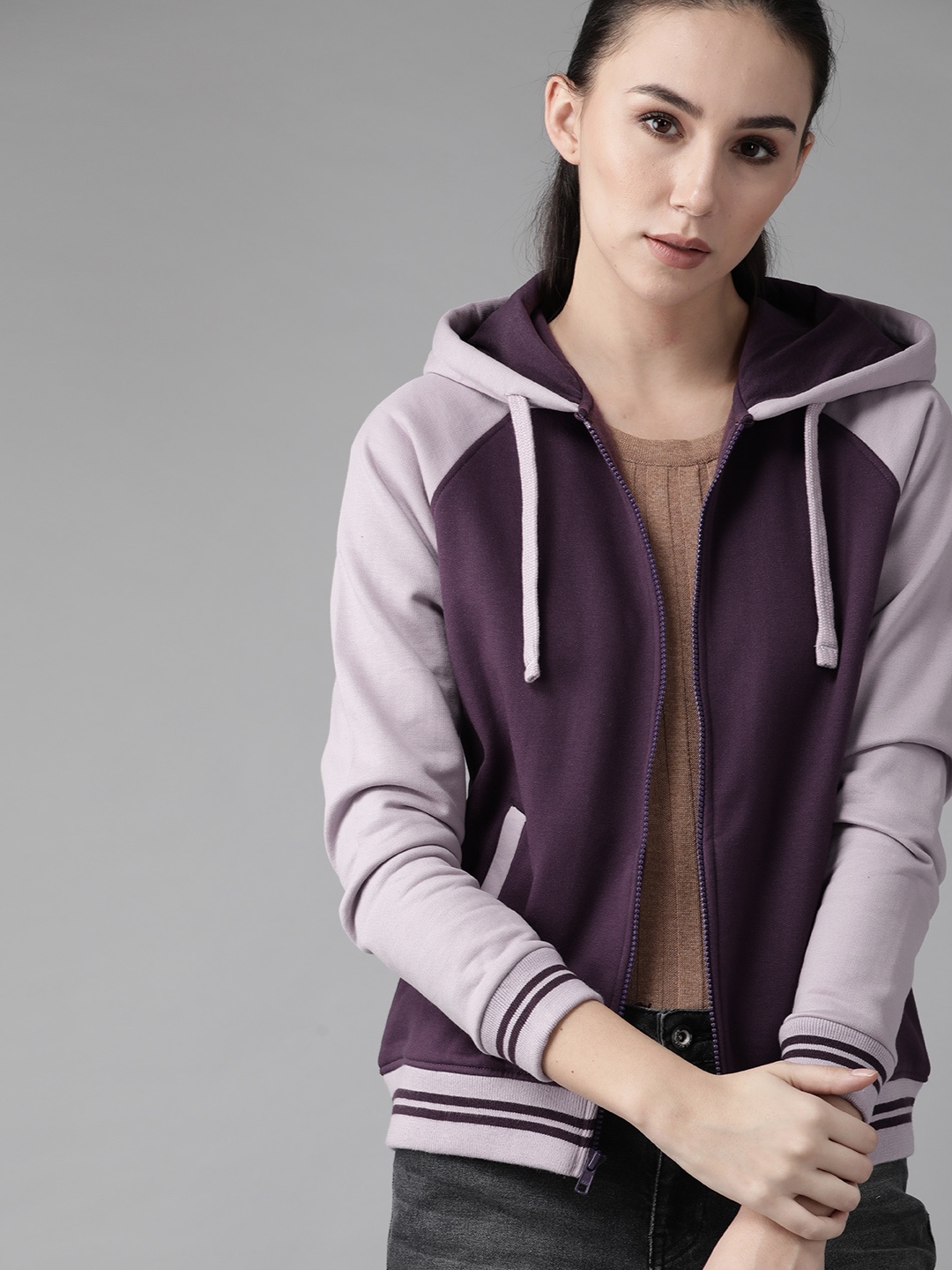 

Roadster Women Purple Solid Hooded Sweatshirt