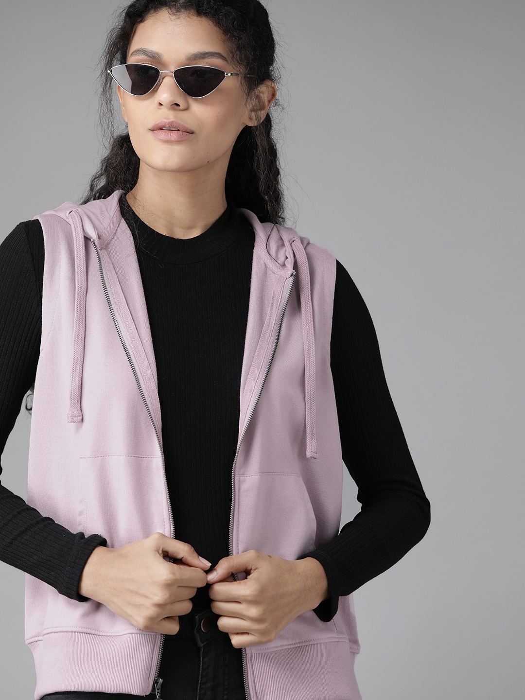 

Roadster Women Lavender Solid Hooded Sweatshirt