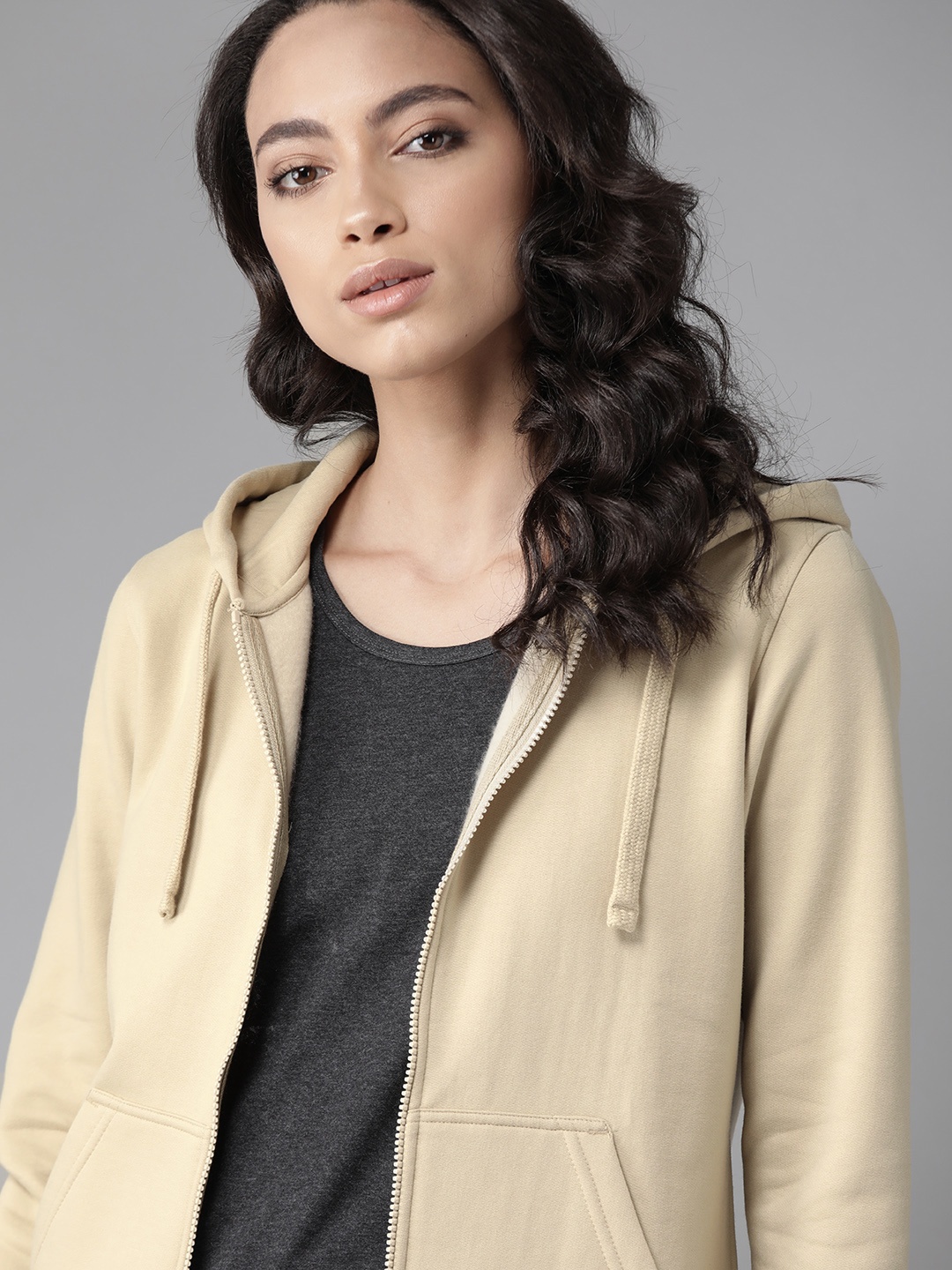 

Roadster Women Beige Solid Hooded Sweatshirt