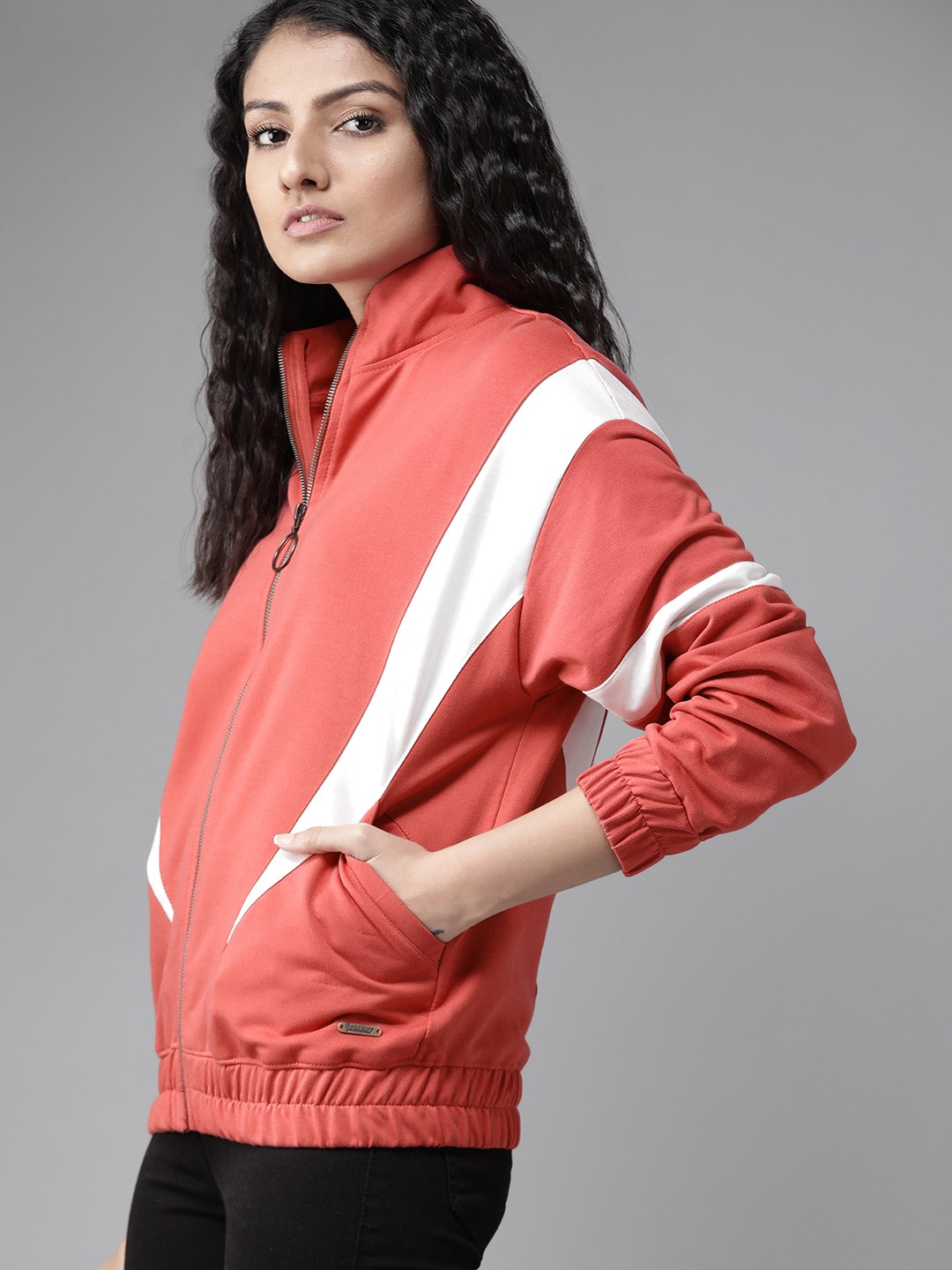 

Roadster Women Coral Pink Solid Sweatshirt