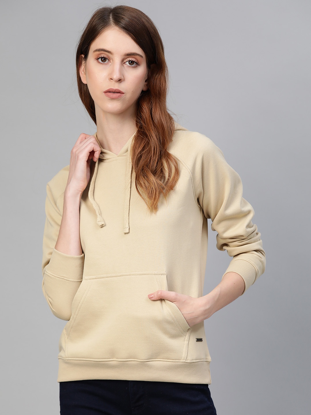 

Roadster Women Beige Solid Hooded Sweatshirt