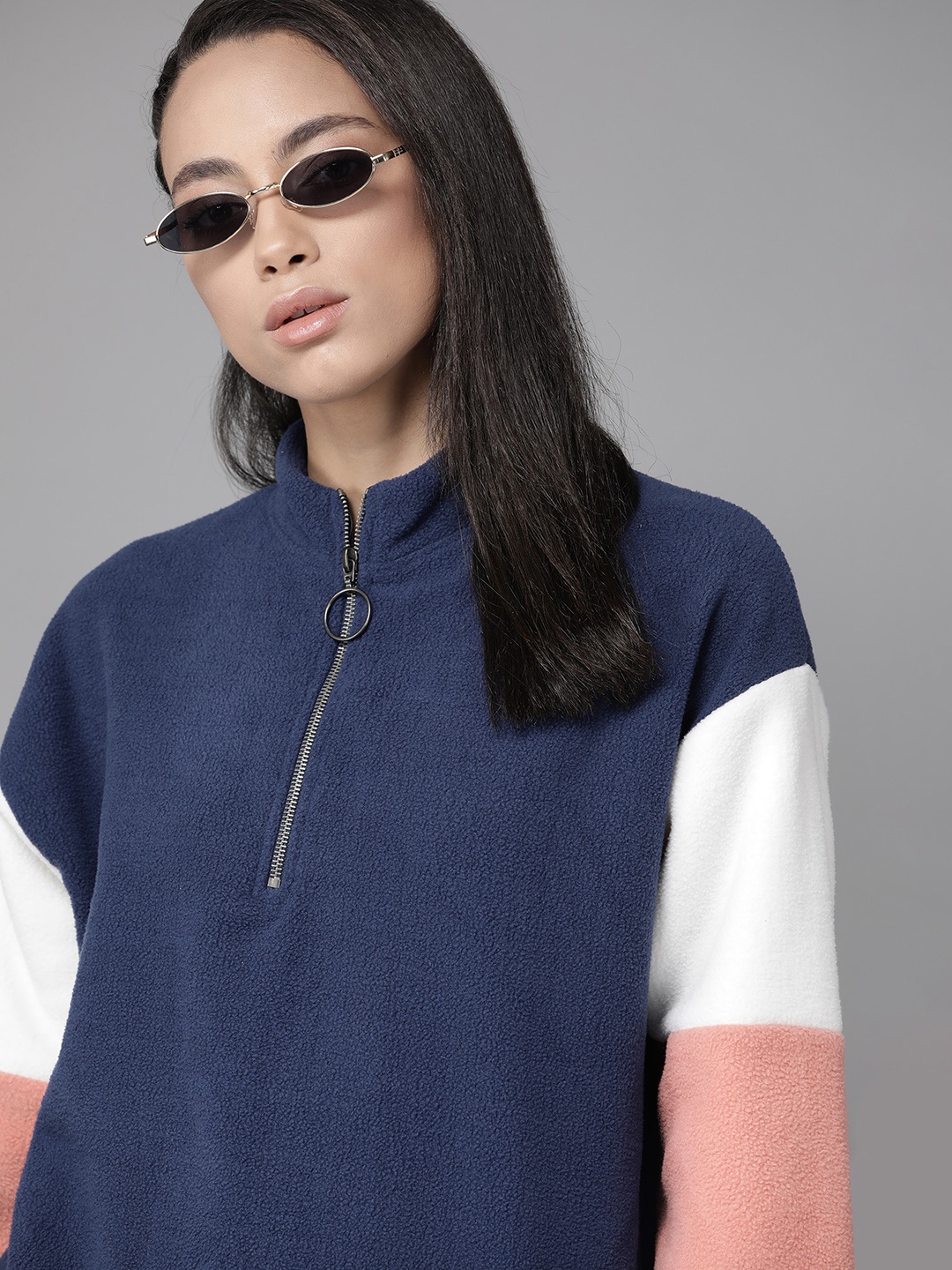 

Roadster Women Blue & White Fleece Solid Sweatshirt