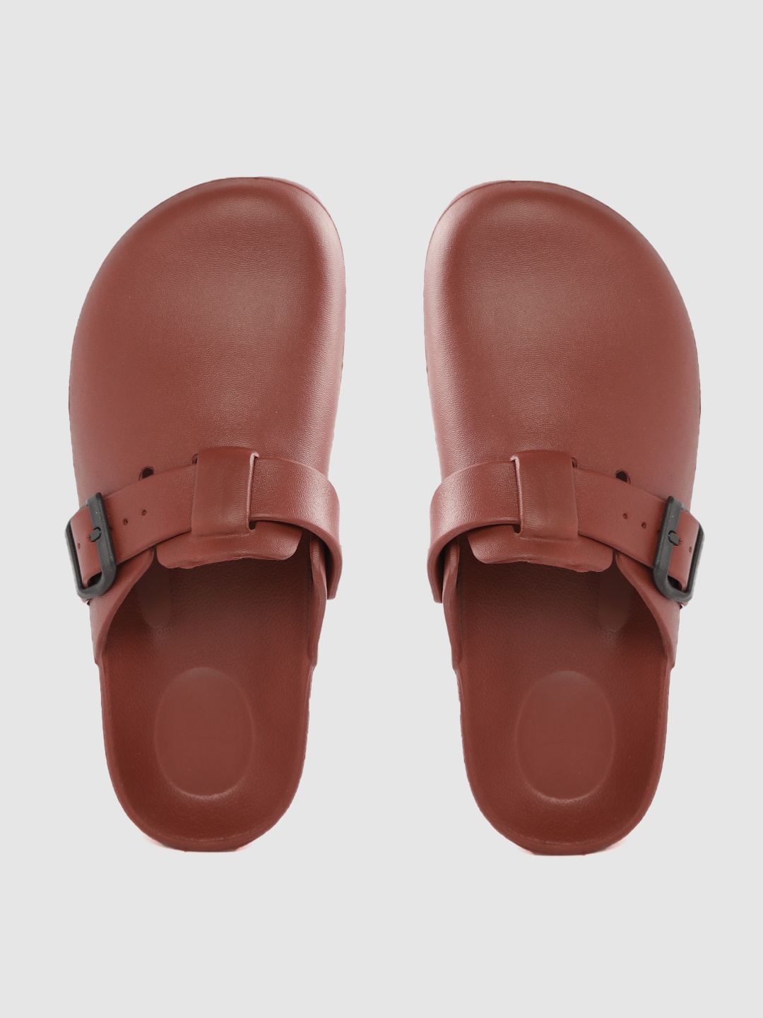 

Roadster Women Maroon Solid Clogs with Buckle Detail