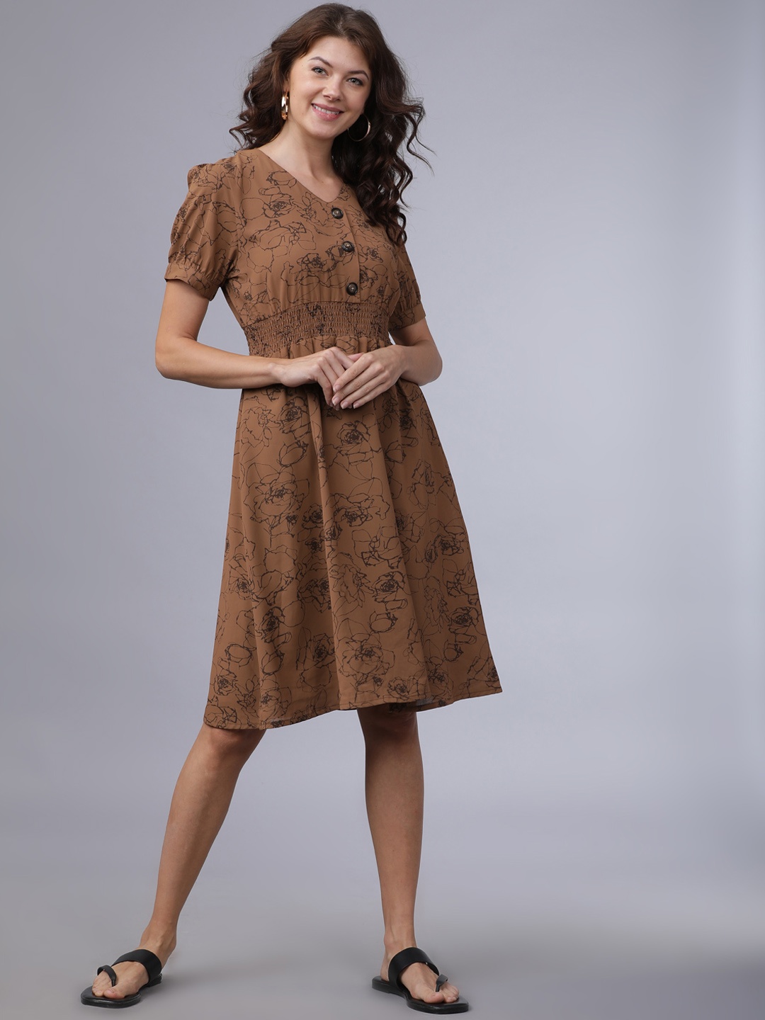 

Tokyo Talkies Women Brown Printed Fit and Flare Dress
