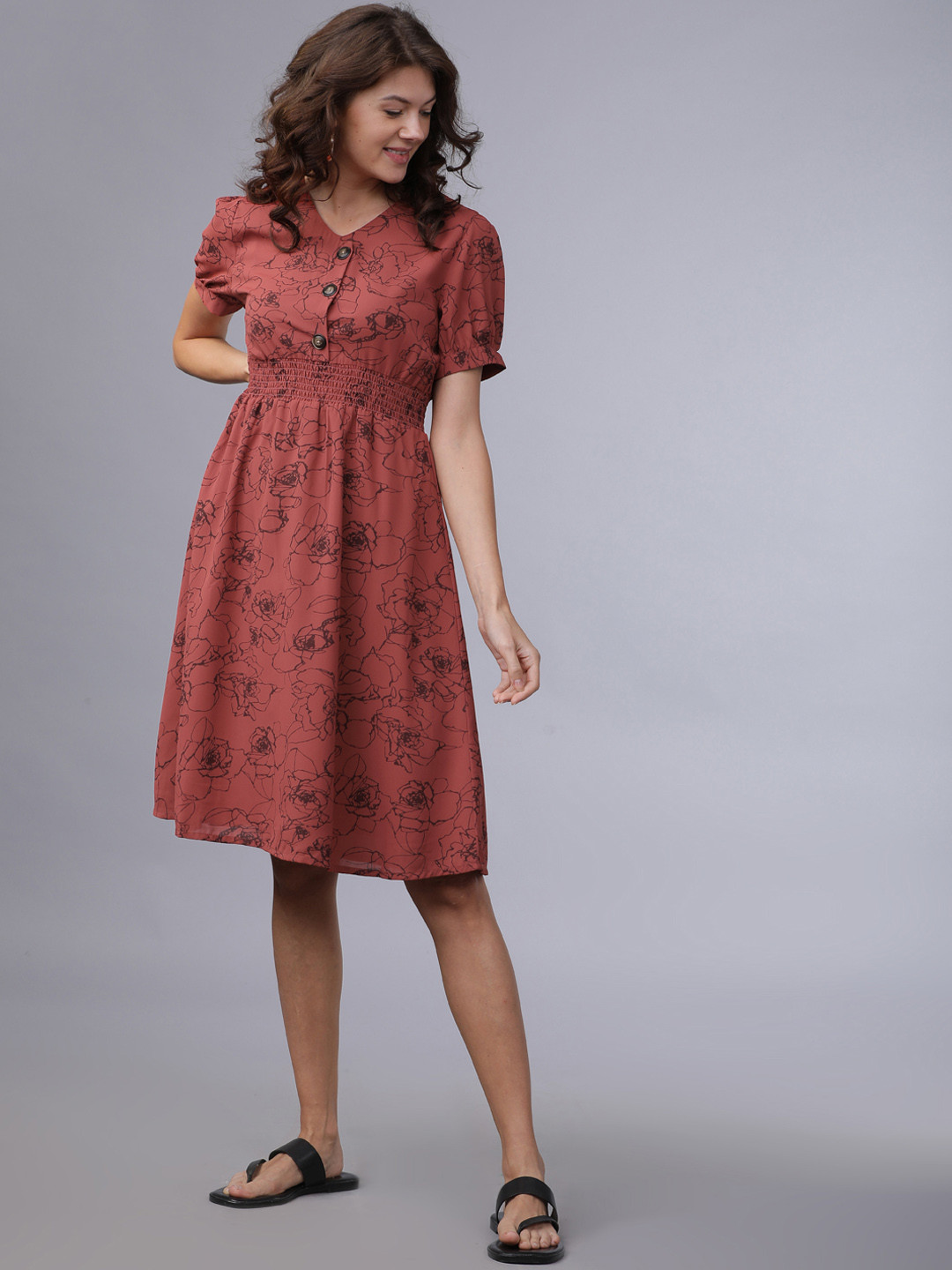 

Tokyo Talkies Women Brown Printed Fit and Flare Dress