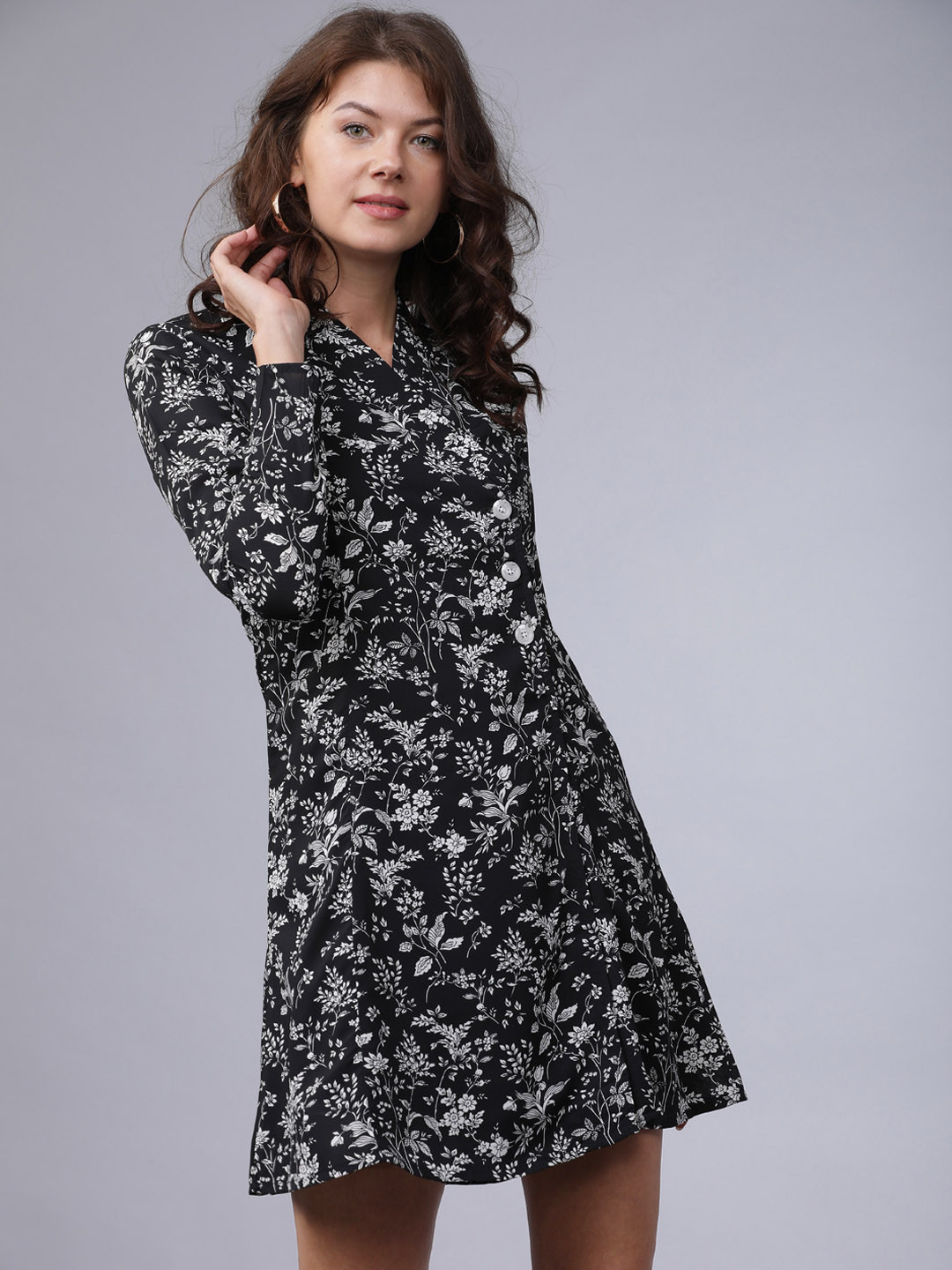 

Tokyo Talkies Women Black Printed Fit and Flare Dress