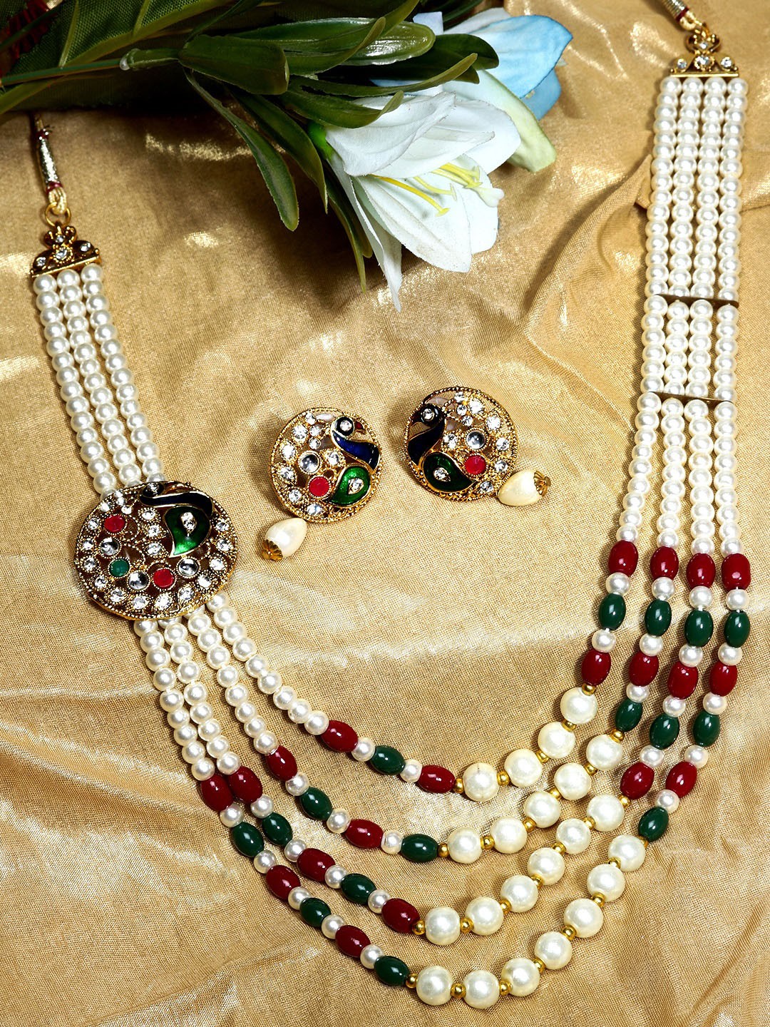 

ANIKAS CREATION Gold-Plated White & Red Stone-Studded Beaded Traditional Jadau Jewellery Set