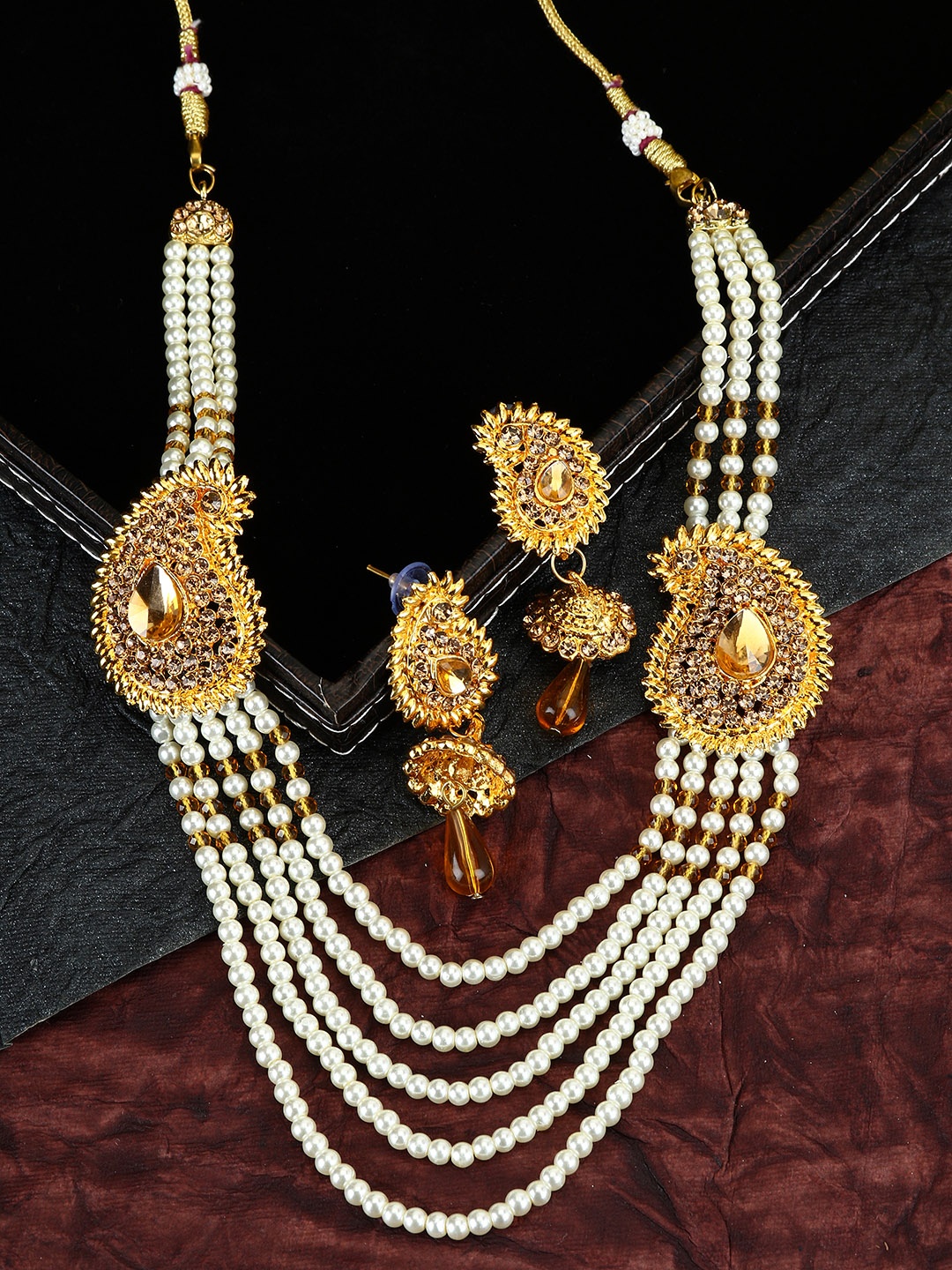 

ANIKAS CREATION Gold-Toned Tan Brown & White Traditional Rani Haar Jewellery Set