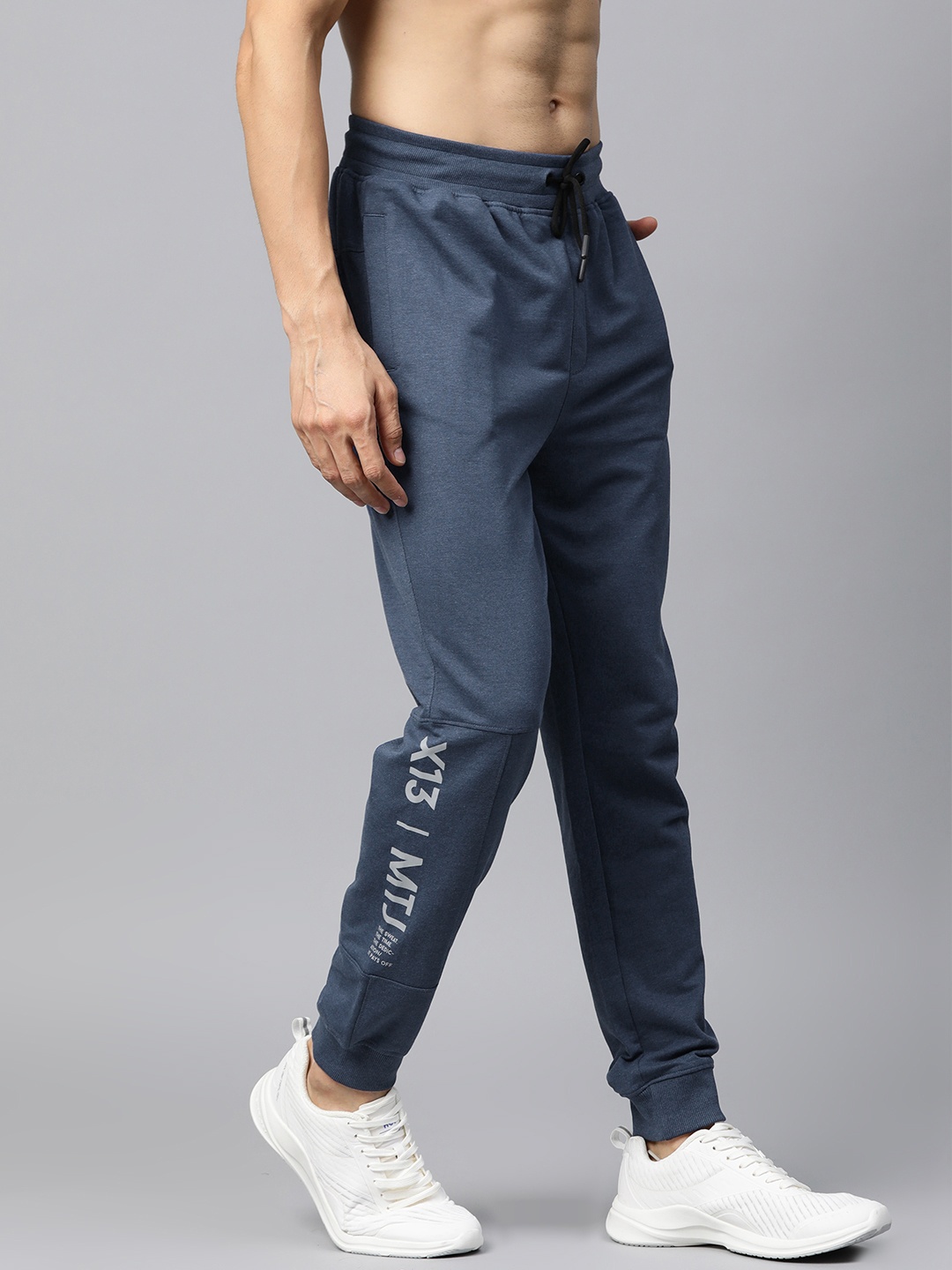 

HRX by Hrithik Roshan Men Navy Melange Solid Regular Fit Bio-Wash Lifestyle Jogger, Navy blue