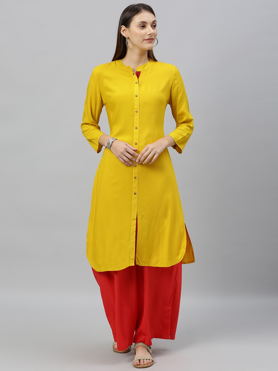 

Anouk Women Mustard Yellow Solid Straight Kurta