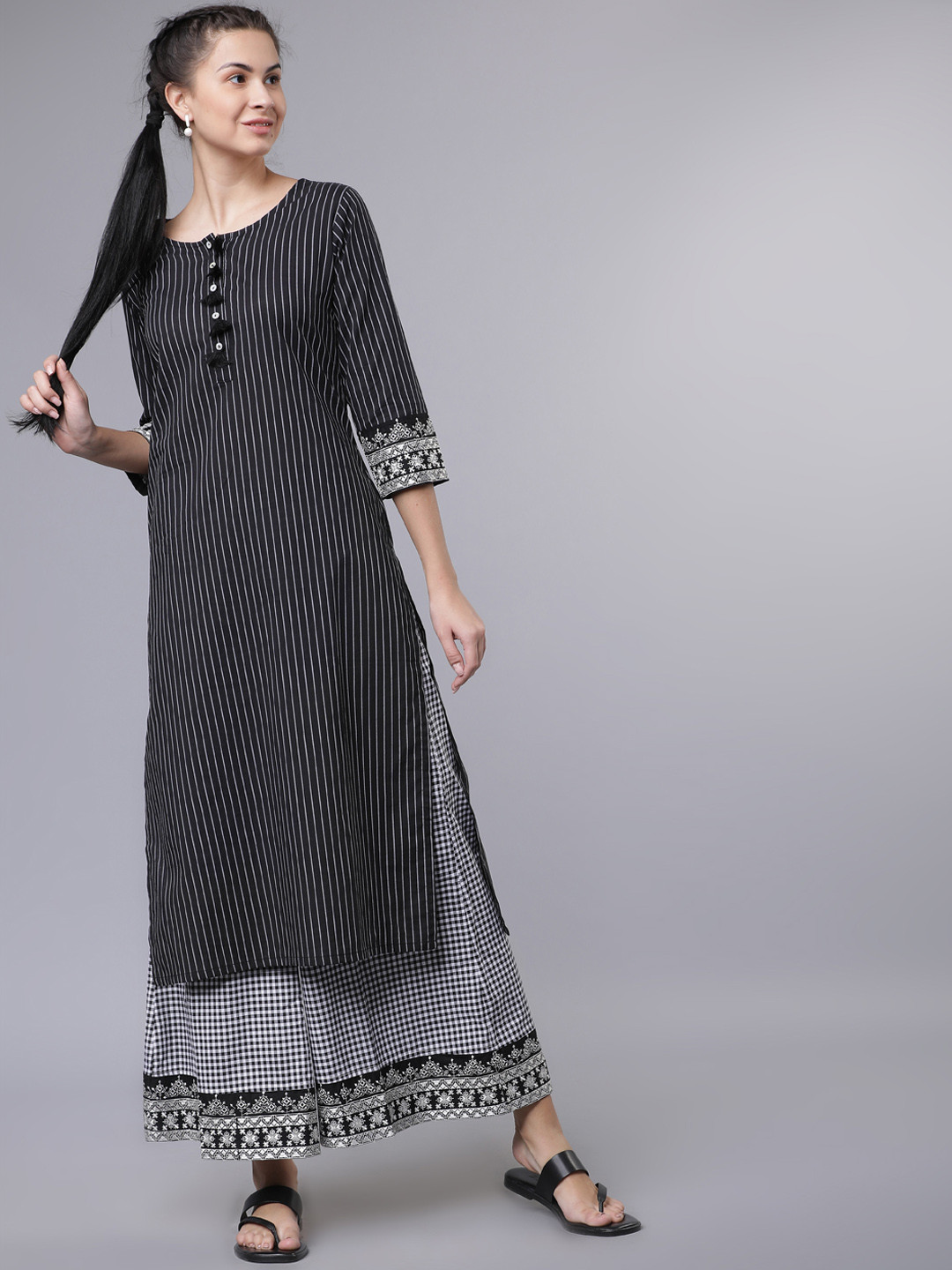 

Vishudh Women Black & White Striped Kurta with Palazzos