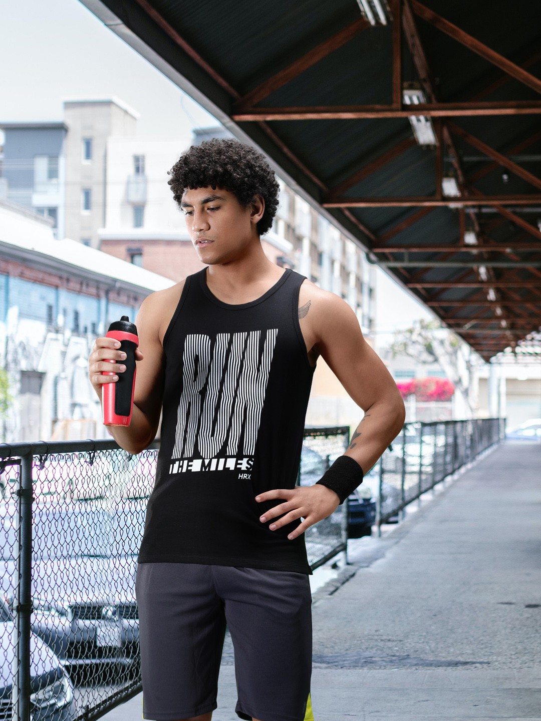 

HRX by Hrithik Roshan Men Black Printed Bio-Wash Running Tank Pure Cotton T-shirt