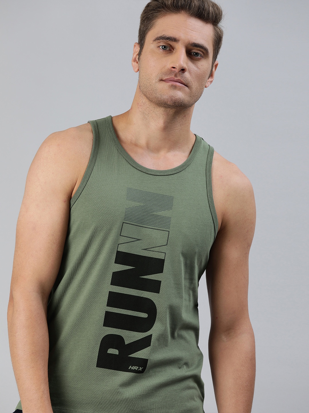 

HRX by Hrithik Roshan Men Olive Green Solid Pure Cotton Bio-Wash Running Tank Top