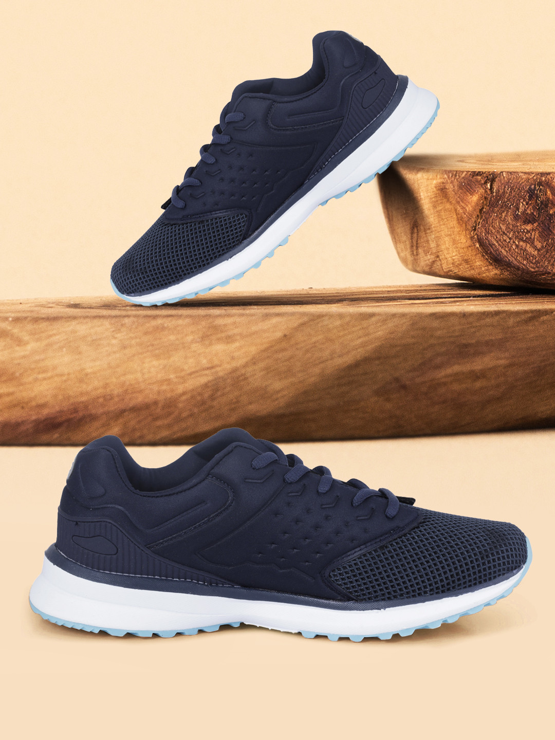 

Khadims Men Navy Blue Textile Running Shoes