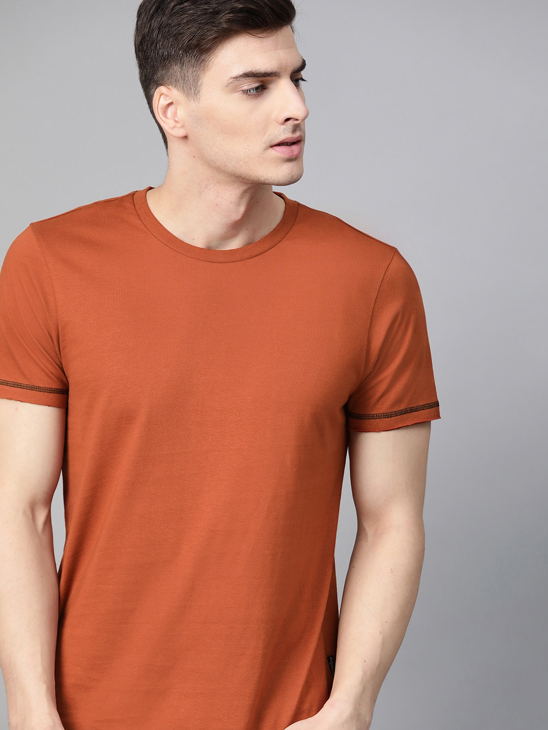 

Roadster Men Rust Brown Solid Round Neck Pure Cotton T-shirt