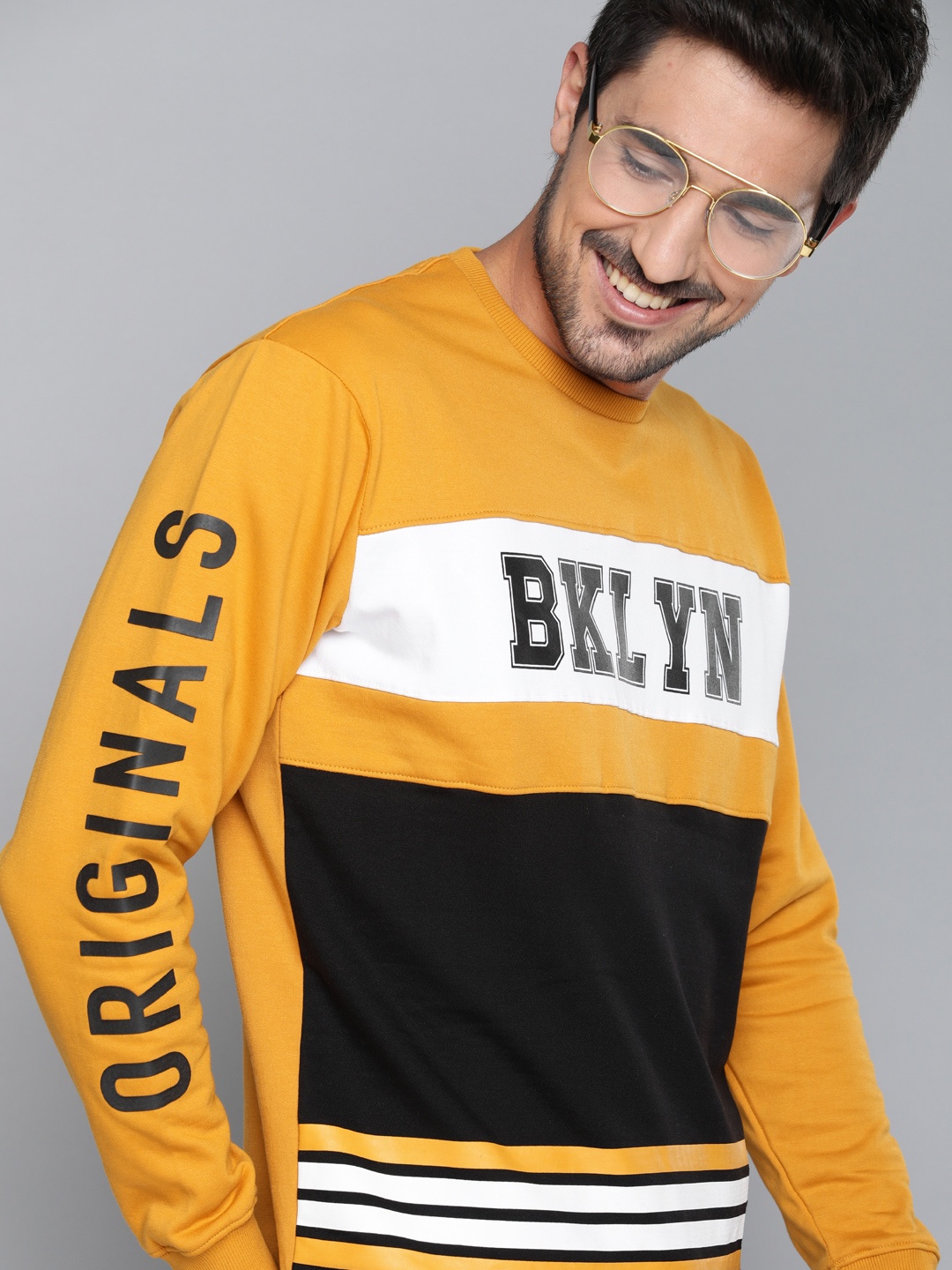 

HERE&NOW Men Mustard Yellow & Black Colourblocked Sweatshirt