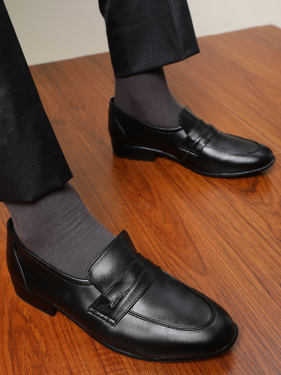 

Liberty Men Black Solid Formal Slip-On Shoes