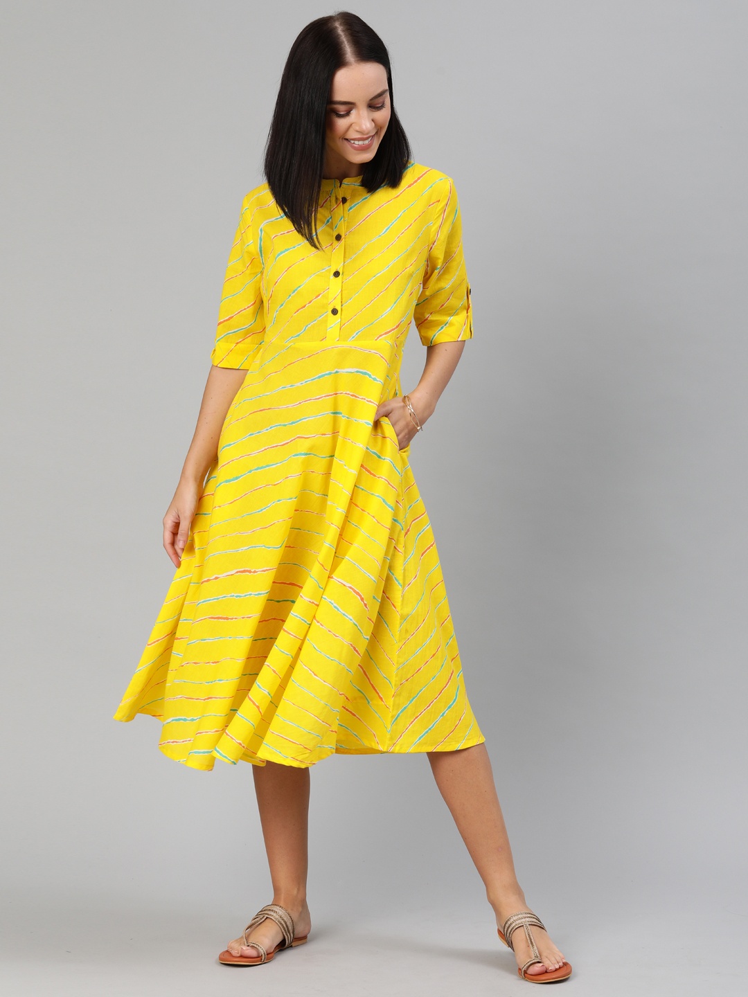 

Anouk Women Yellow & Blue Striped Fit and Flare Dress With Roll-up Sleeves