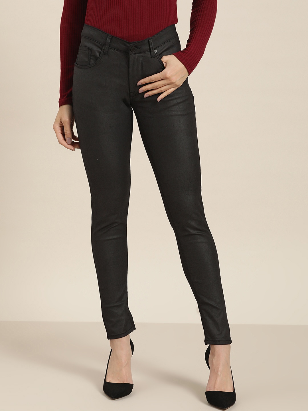 

Moda Rapido Women Black Coated Skinny Fit Mid-Rise Clean Look Stretchable Jeans