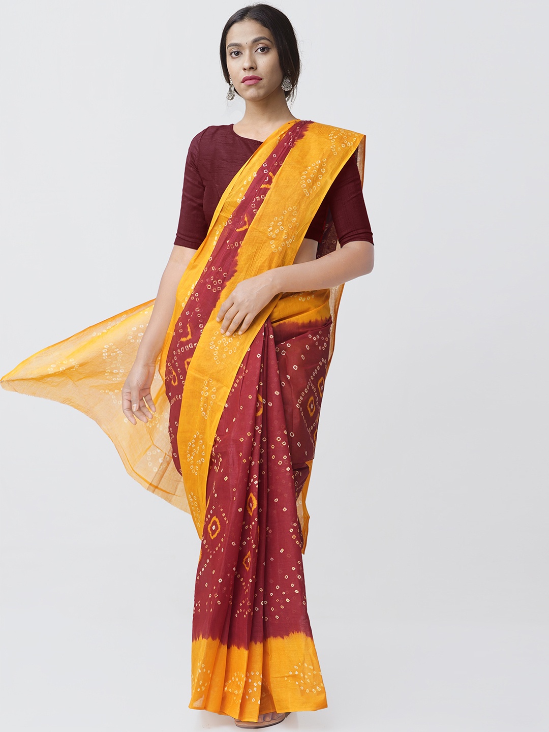 

Unnati Silks Maroon & Yellow Tie & Dyed Bandhani Handloom Sustainable Saree