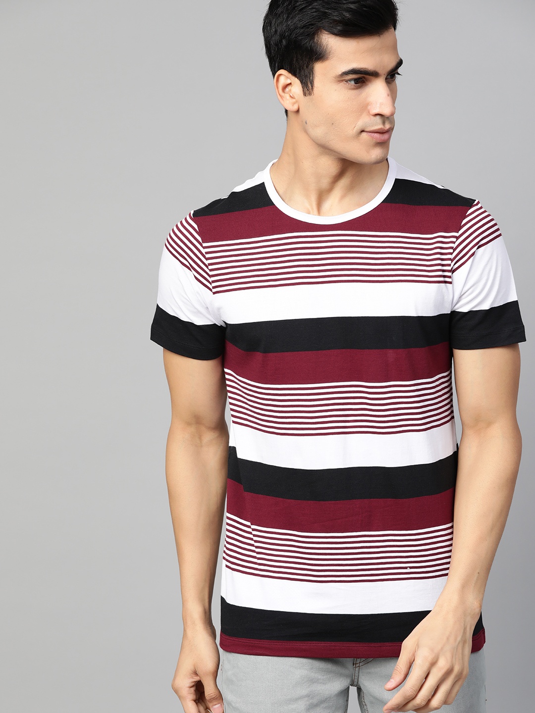 

Roadster Men White & Maroon Striped Round Neck T-shirt