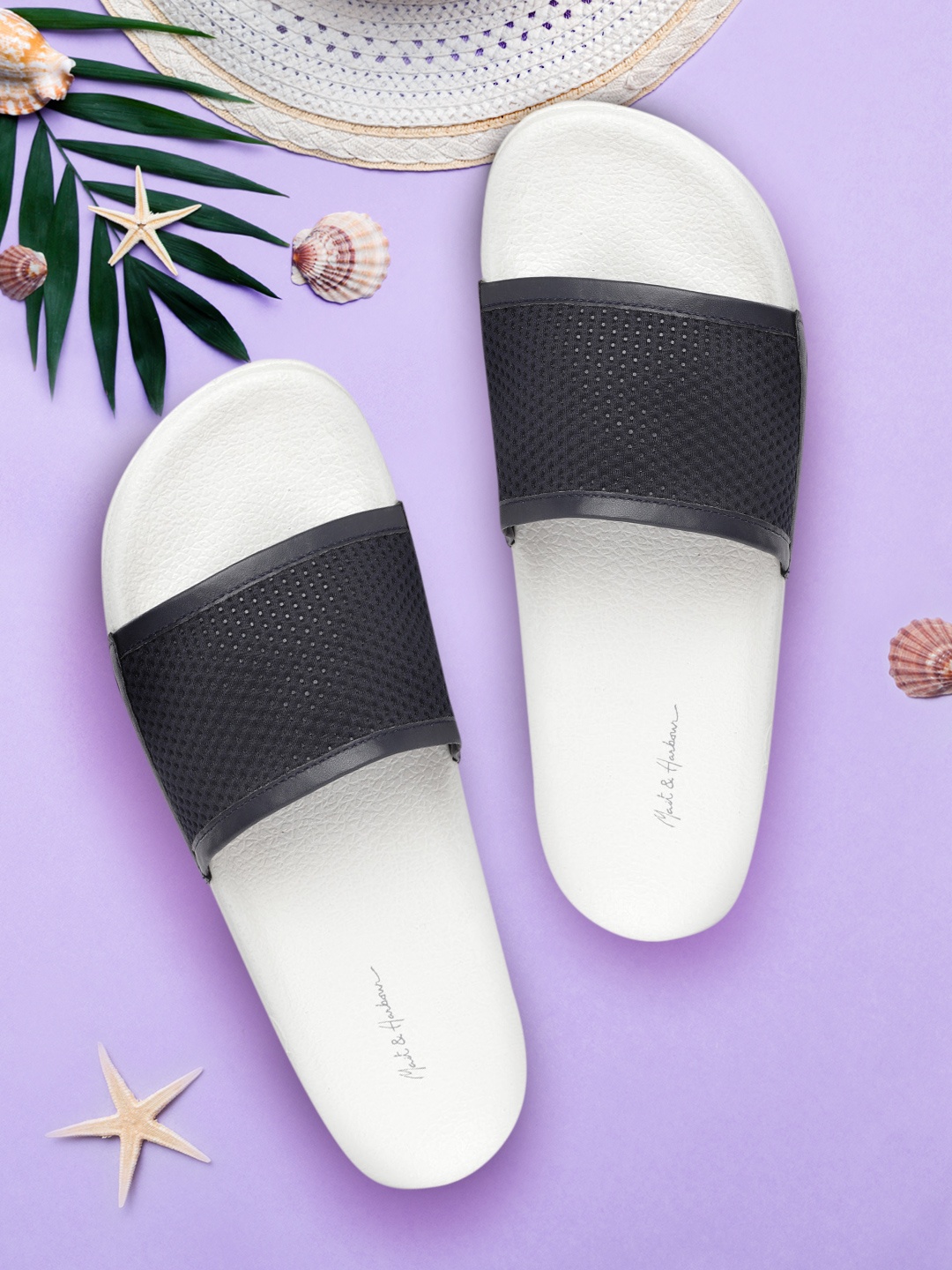 

Mast & Harbour Women Navy Blue & White Self Design Sliders