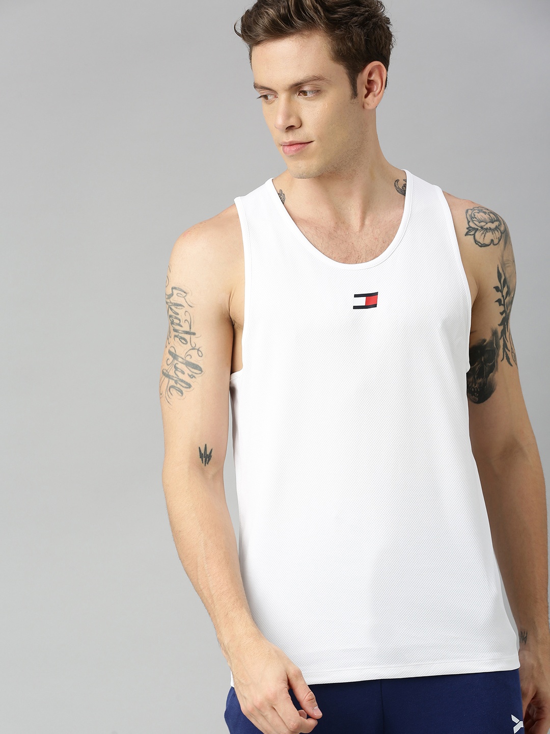 

Tommy Hilfiger Men White Solid Round Neck Training T-shirt