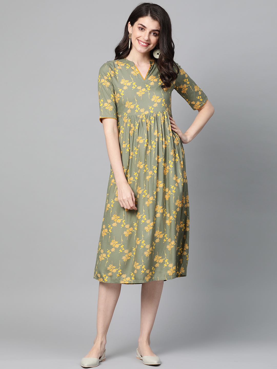 

Indo Era Women Green & Yellow Floral Print A-Line Dress