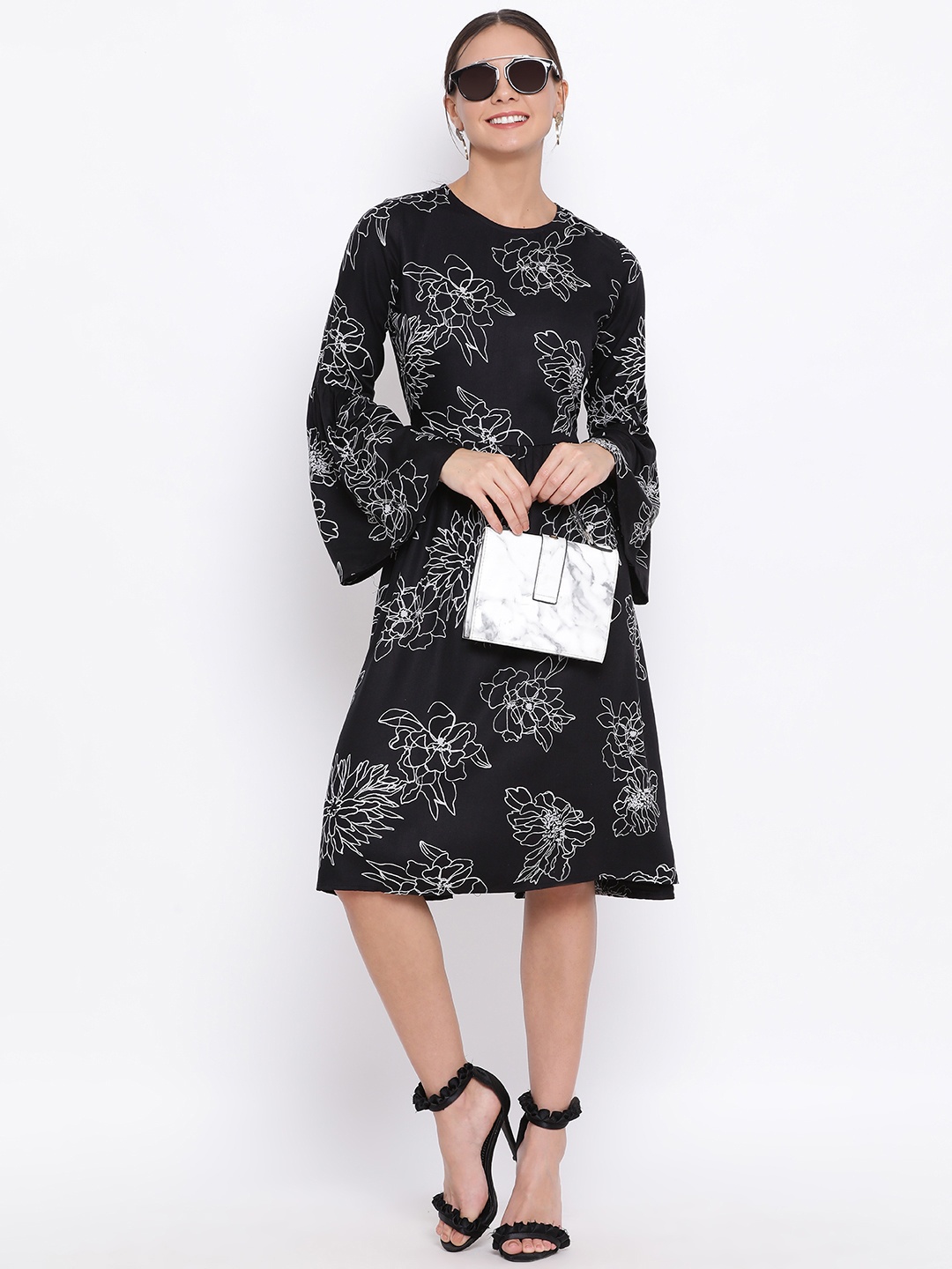 

Crimsoune Club Women Black Floral Printed Fit and Flare Dress