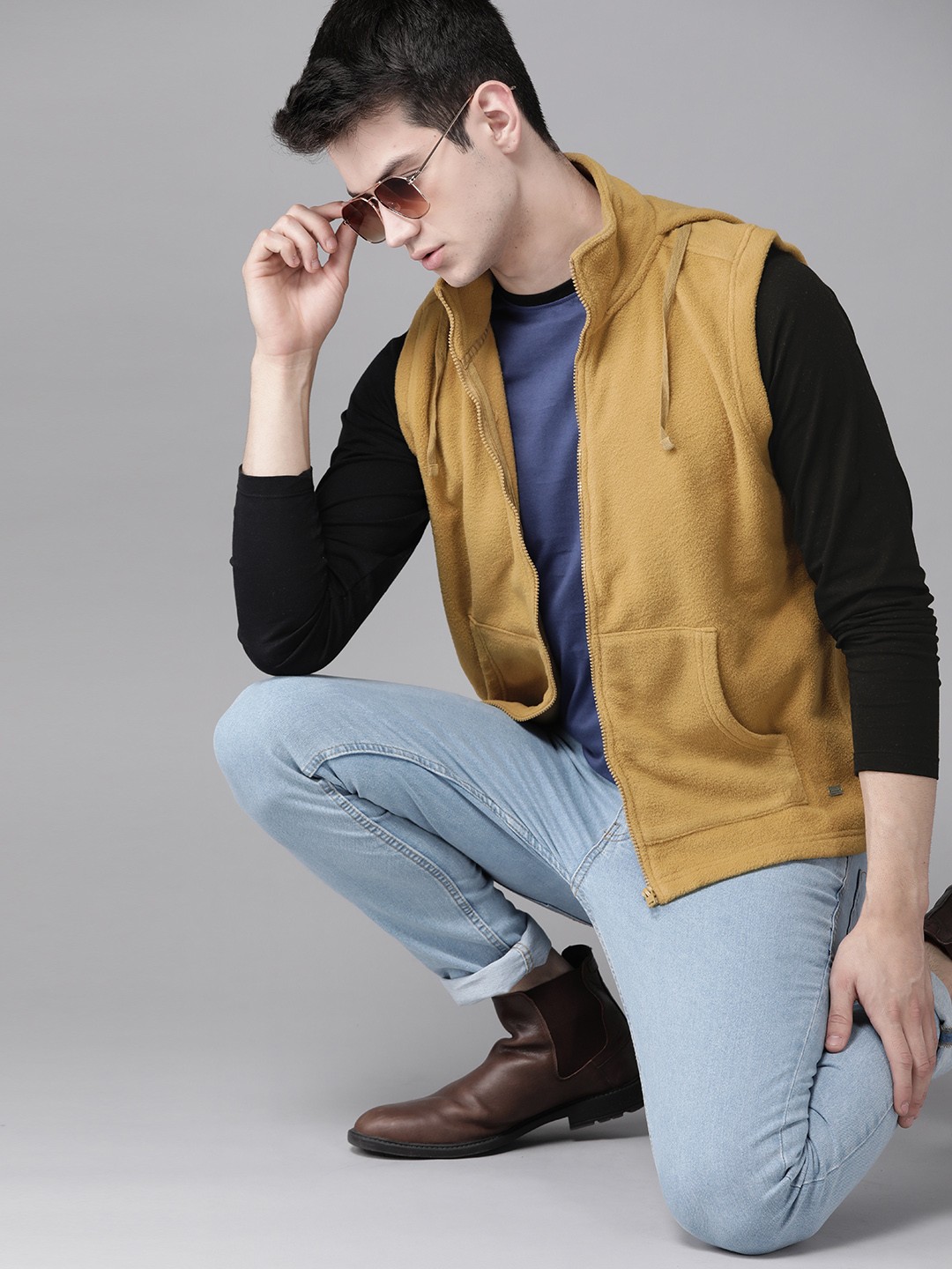 

Roadster Men Khaki Solid Sleeveless Fleece Jacket