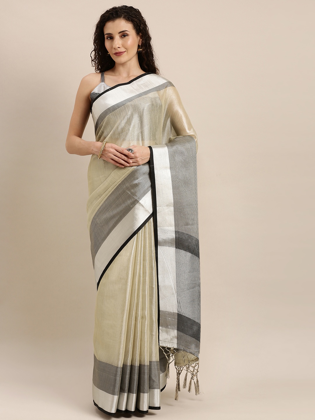 

Inddus Beige & Black Tissue Solid Saree