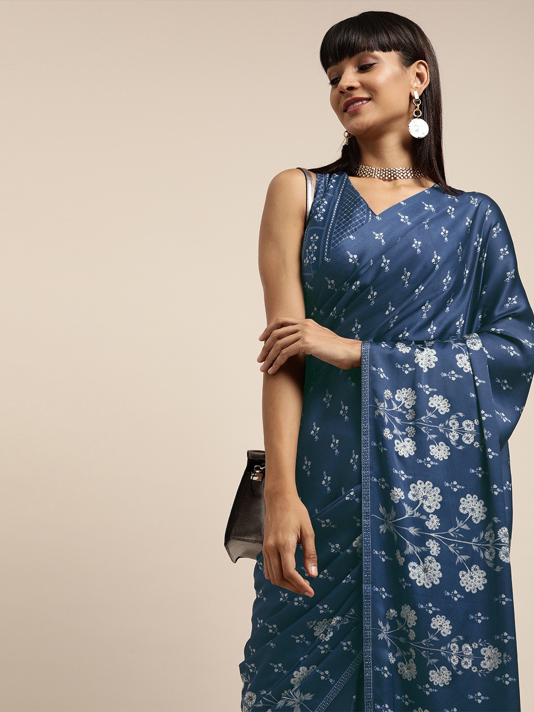 

Inddus Blue & White Printed Satin Saree